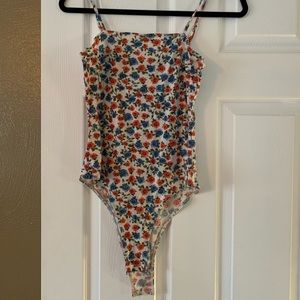 Blue and red flowered body suit